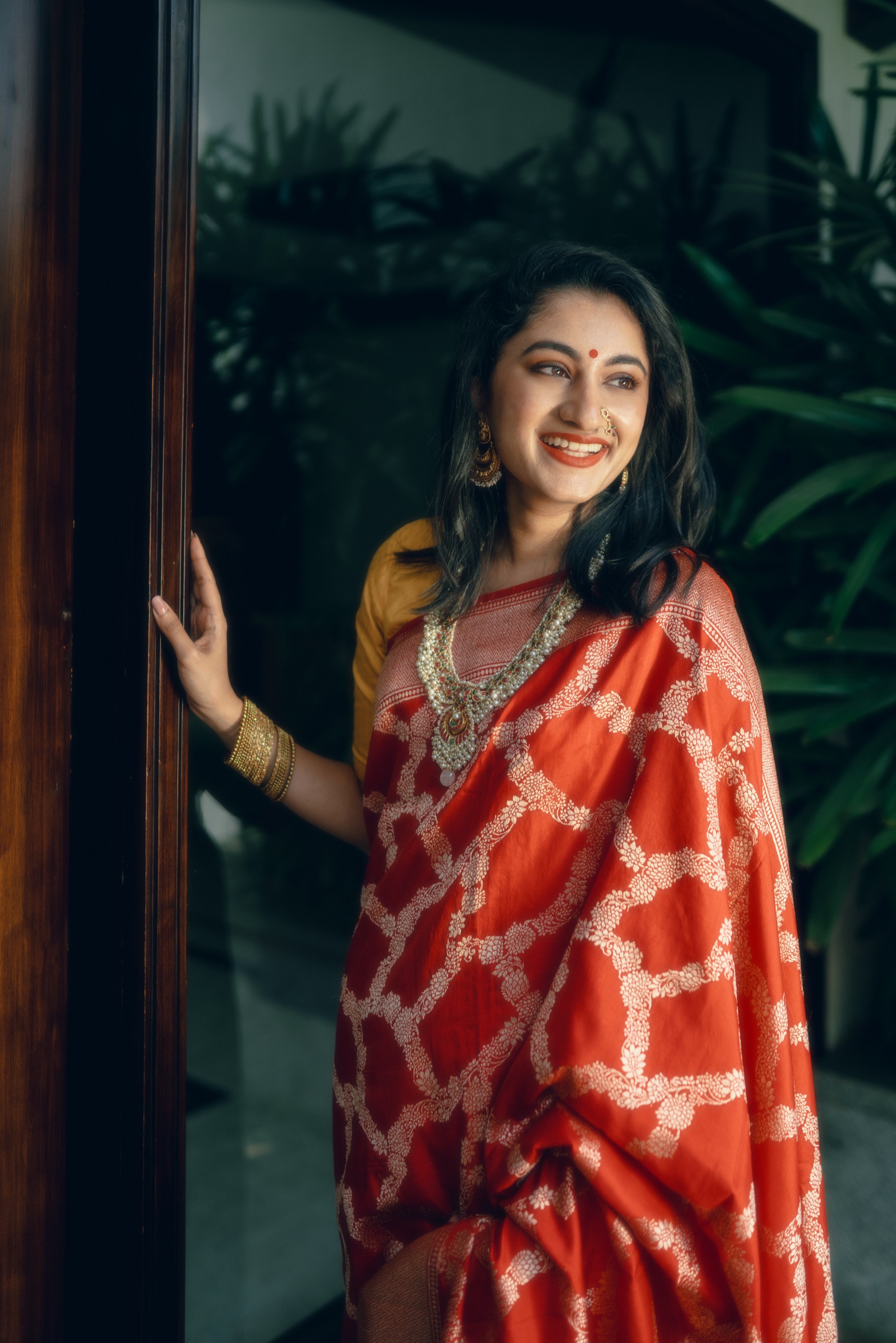 Akshatha Nagendra in a red silk saree