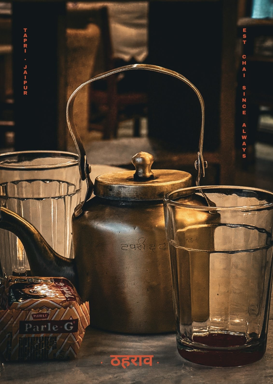 Styled poster of a brass chai kettle and glass tumblers at Tapri Jaipur